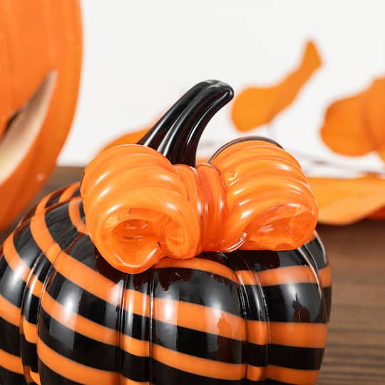 Glitzhome® 4.75" Halloween Striped Glass Pumpkin with Bow